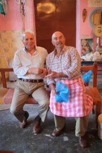 The butcher and his friend, Paros.